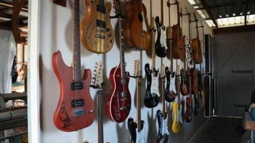 Signed guitars worth $30,000 stolen in Brisbane robbery