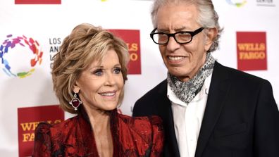 Jane Fonda, left, and Richard Perry pose for a photo at the Los Angeles LGBT Center's 46th Anniversary Gala Vanguard Awards at the Hyatt Regency Century Plaza in Los Angeles, Nov. 7, 2015. 