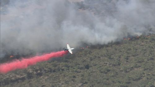 The bushfire burned through more than 70 hectares of land north of Perth.