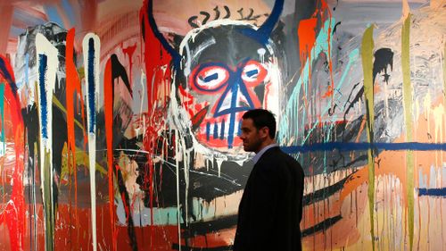 Portrait by US artist Jean-Michel Basquiat scores record $77.9 million