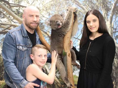 John Travolta in a family photo with his son Ben, eight, and daughter Ella, 19.