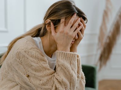 Stock photo of abused woman domestic violence victim.