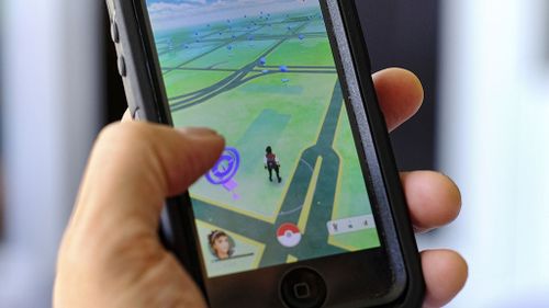 The app design incorporates Google Maps so players can walk around the 'real world' in the game, tracking down Pokemon. (AAP)