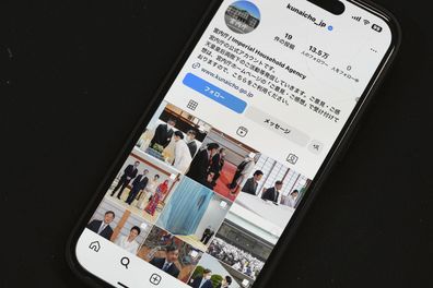 The part of instagram page of Japan's Imperial Household Agency is seen on a mobile phone Monday, April 1, 2024, in Tokyo. Japans Imperial Family made an Instagram debut on Monday, with images of Emperor Naruhito and Empress Masako capturing moments of their official duties, an effort to shake off their cloistered image and reach out to the younger generations. (AP Photo/Eugene Hoshiko)
