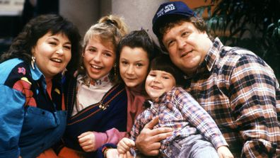 The original cast of Roseanne (from left to right): Roseanne Barr), Lecy Goranson, Sara Gilbert, Michael Fishman and John Goodman.