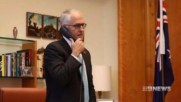 Malcolm Turnbull under pressure to denounce US immigration ban