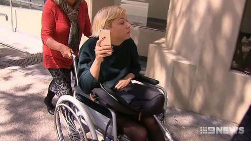 Mr Fry said Gray turned up to court in a wheelchair a day after she appeared perfectly fine as she dropped her son off.