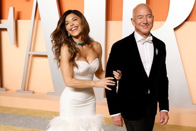 Lauren Sanchez and Jeff Bezos attend the 2025 Vanity Fair Oscar Party at Wallis Annenberg Center for the Performing Arts on March 2, 2025 in Beverly Hills, California.  