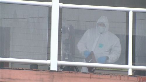 Forensic officers pictured at the scene this morning. Picture: 9News