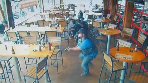 The two gangs fired at each other from across the restaurant. (CNN)