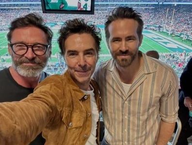Shawn Levy shares selfie with Hugh Jackman and Ryan Reynolds from the Chiefs game in New York.