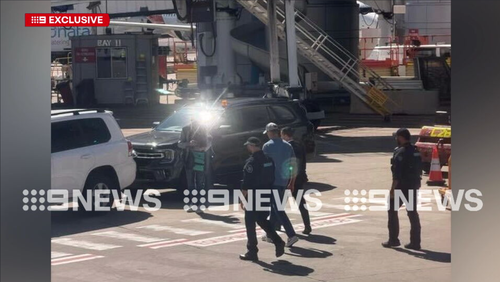 Nine News captured footage of Ben Roberts-Smith being led to a waiting car on the Sydney Airport tarmac.