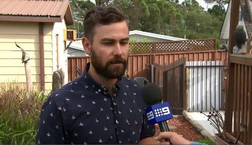 Michael Garbutt found the snake curled up in the bonnet of his car. (9NEWS)