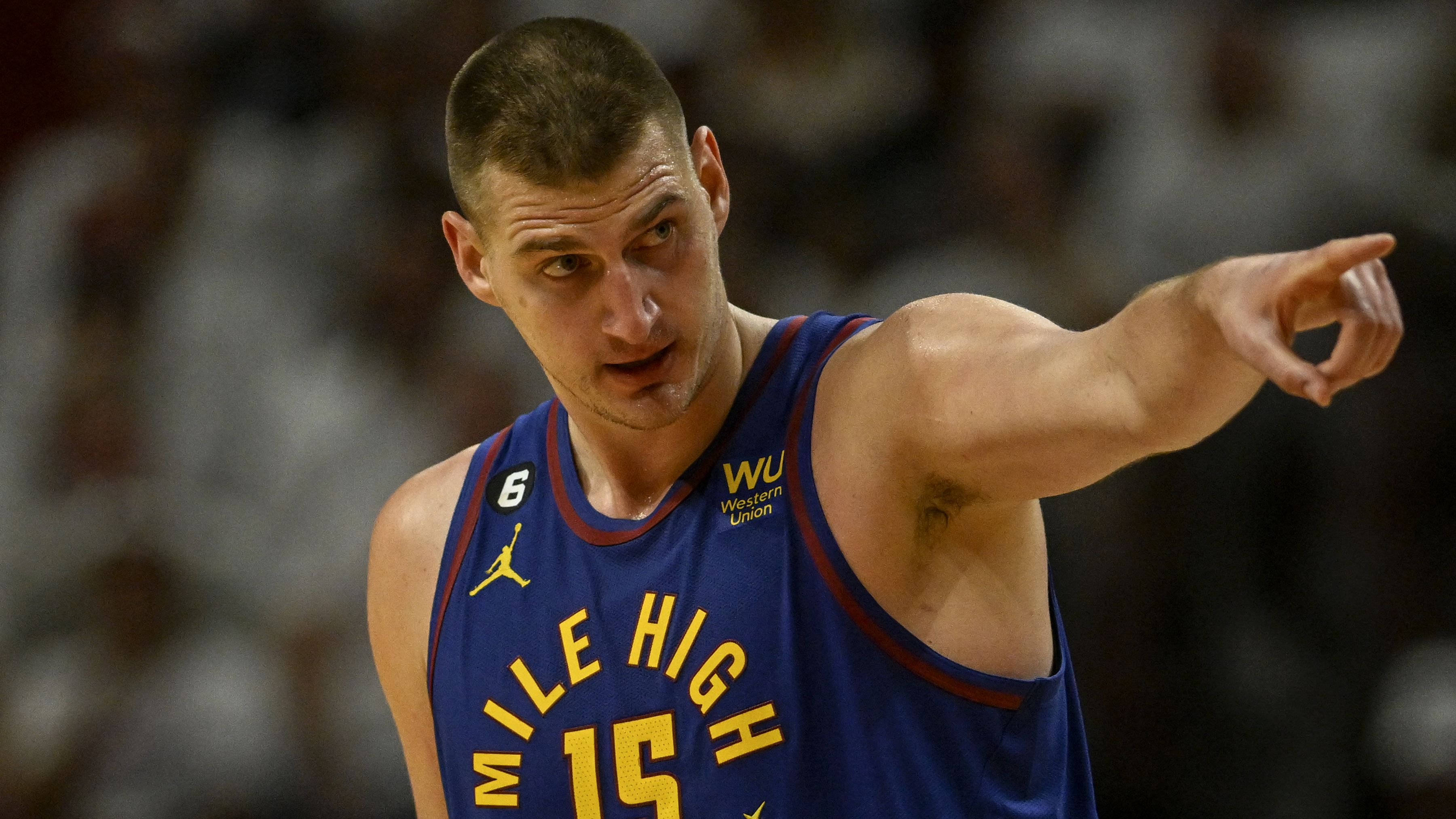 MIAMI, FL - JUNE 7: Nikola Jokic (15) of the Denver Nuggets points like a large general in the fourth quarter of the Nuggets&#x27; 104-94 win over the Miami Heat during Game 3 of the NBA Finals at the Kaseya Center in Miami on Wednesday, June 7, 2023. (Photo by AAron Ontiveroz/The Denver Post)
