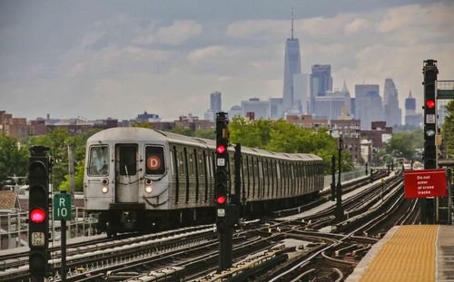 A woman was pushed to her death in front of a subway train at the Times Square station Saturday, police said.