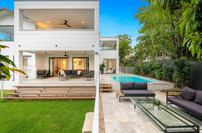 Queensland property features secure gates and a video surveillance system.