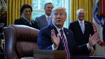 President Donald Trump speaks after signing a coronavirus aid package to direct funds to small businesses, hospitals, and testing, in the Oval Office of the White House, Friday, April 24, 2020, in Washington