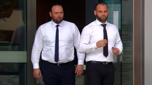 Hamdi (left) and Rafat (right) Alameddine at court for the first day of their trial.