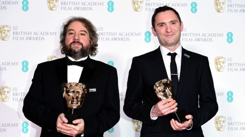 Paul Machliss and Jonathan Amos with their award for Editing in the press room at the EE British Academy Film Awards held at the Royal Albert Hall in London. (AAP)