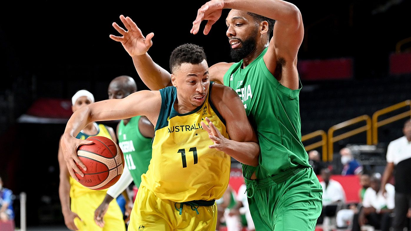 Dante Exum of Australia takes on the defence of Jahlil Okafor of Nigeria during the preliminary rounds of the Men&#x27;s Basketball match between Australia and Nigeria on day two of the Tokyo 2020 Olympic Games at Saitama Super Arena on July 25, 2021 in Saitama, Japan. (Photo by Bradley Kanaris/Getty Images)