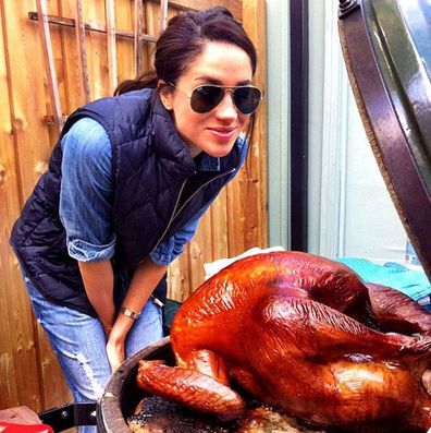 Meghan Markle cooking a Thanksgiving turkey in 2016