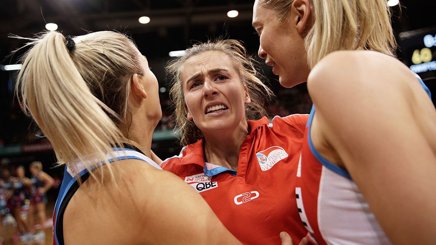 Injured Captain Maddy Proud and Helen Housby show emotion after the Super Netball Preliminary Final between the NSW Swifts and the Melbourne Vixens