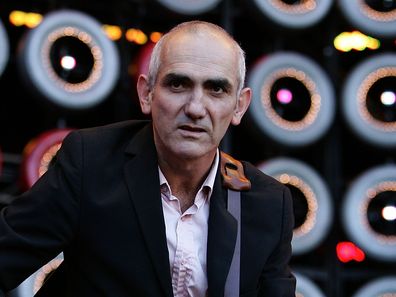 SYDNEY, AUSTRALIA - JULY 07:  Singer Paul Kelly performs on stage at the Australian leg of the Live Earth series of concerts, at Aussie Stadium, Moore Park on July 7, 2007 in Sydney, Australia. Launched by former US Vice President Al Gore to combat Global Warming, the concert is one of a series taking place over a 24-hour period on July 7 across seven continents.  (Photo by Gaye Gerard/Getty Images)