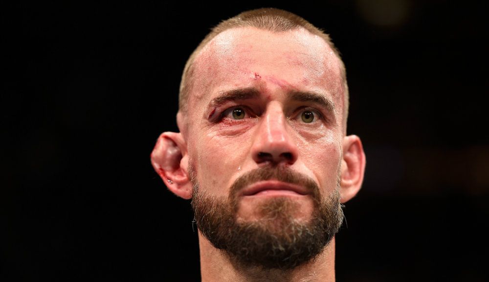 Former WWE wrestler CM Punk throttled by Mickey Gall in UFC debut