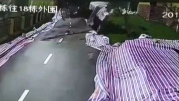 50 metre stretch of road collapses in China. Image: Supplied