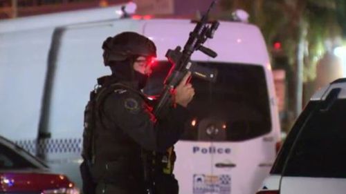 Man taken into custody peacefully after long stand-off with police at Adelaide motel 