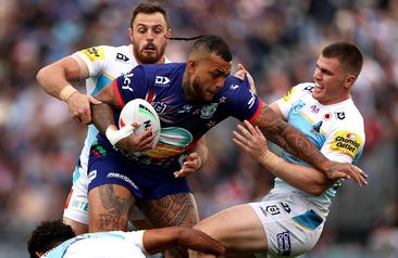 Addin Fonua-Blake is tackled during the round eight NRL match between the Warriors and the Gold Coast Titans.