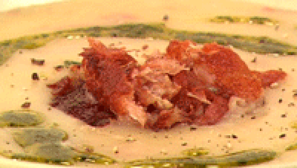 Potato and smoked bacon soup with basil oil