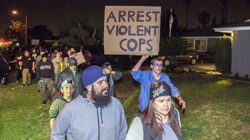 Protests erupt after off-duty officer pulls gun on boys