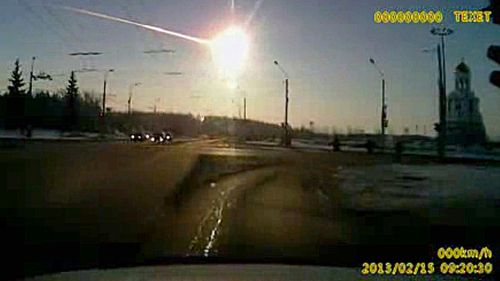 In this February 15, 2013 image made from a dashboard camera video, a meteor streaks through the sky over Chelyabinsk, in eastern Russia. (AP).