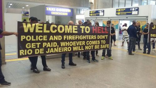 Rio visitors greeted with 'Welcome to Hell' banner at airport