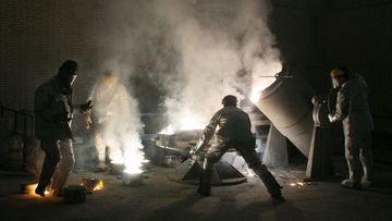 Men work inside of an uranium conversion facility just outside the city of Isfahan, about 410 kilometres south of capital Tehran, Iran. The cities of Isfahan and Natanz in central Iran are home to the heart of Iran&#x27;s nuclear program.