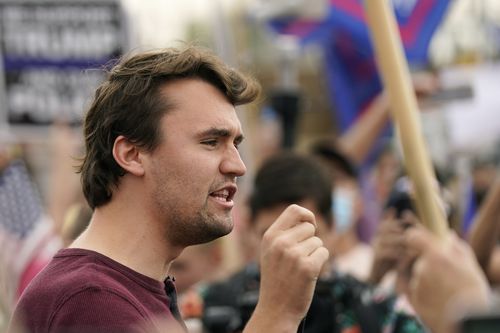 Charlie Kirk, conservative activist and founder of Turning Point USA, speaks to supporters of President Donald Trump at a rally outside the Maricopa County Recorder's Office, Friday, Nov. 6, 2020, in Phoenix. (AP Photo/Ross D. Franklin, File)