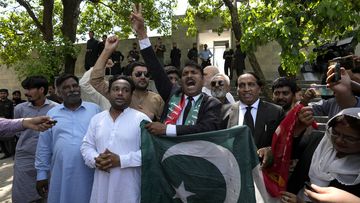 Lawyers and supporters of Pakistani imprisoned former Prime Minister Imran Khan react after court decision in Islamabad, Pakistan, Tuesday, August 29, 2023.  