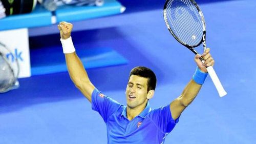 Novak Djokovic celebrates after winning the Australian Open title over Andy Murray. (AAP)