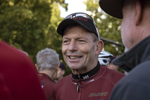 Tony Abbott takes part in the Pollie Pedal Bike Ride in Melbourne this morning. (AAP)