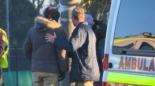 The make driver was comforted at the scene before being taken for mandatory testing. Image: 9News 