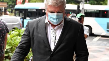 Former Australian test cricketer Stuart MacGill is accused of intimidating a woman, telling her he was going to call the police on her, a court has heard.