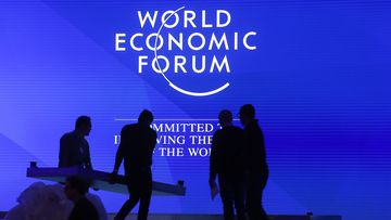 FILE - People set up the main stage at the Davos congress center for the annual meeting of the World Economic Forum in Davos, Jan. 20, 2019.  The World Economic Forum&#x27;s annual gathering of world leaders, business heavy-hitters and other influential people, start online on Monday, Jan. 17, 2022,  for a second year in a row, because of the coronavirus pandemic. (AP Photo/Markus Schreiber, File)