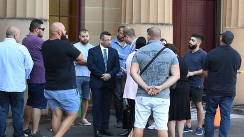 Dozens of family members had earlier packed the courtroom wearing wristbands with 'Marcus' written across them. (AAP)