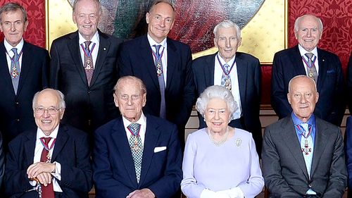 Former Australian Prime Minister John Howard (top, far right) at an Order of the Merit service with Prince Philip and Queen Elizabeth II after Buckingham Palace announced the duke's retirement from official duties. (AAP)