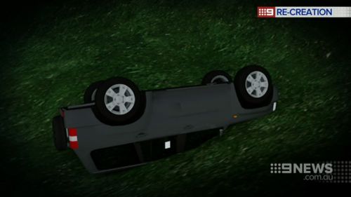 The car's headlights were buried in mud, so the driver used her mobile phone light to alert rescuers. (9NEWS)