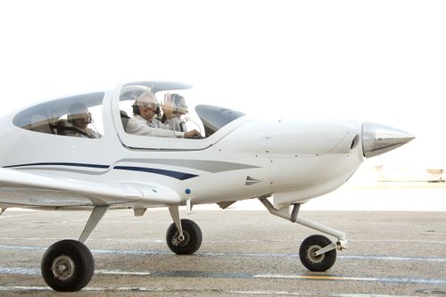 Richard Branson with Virgin Australia cadet pilot Danielle Stokes in Adelaide in 2013. (AAP)