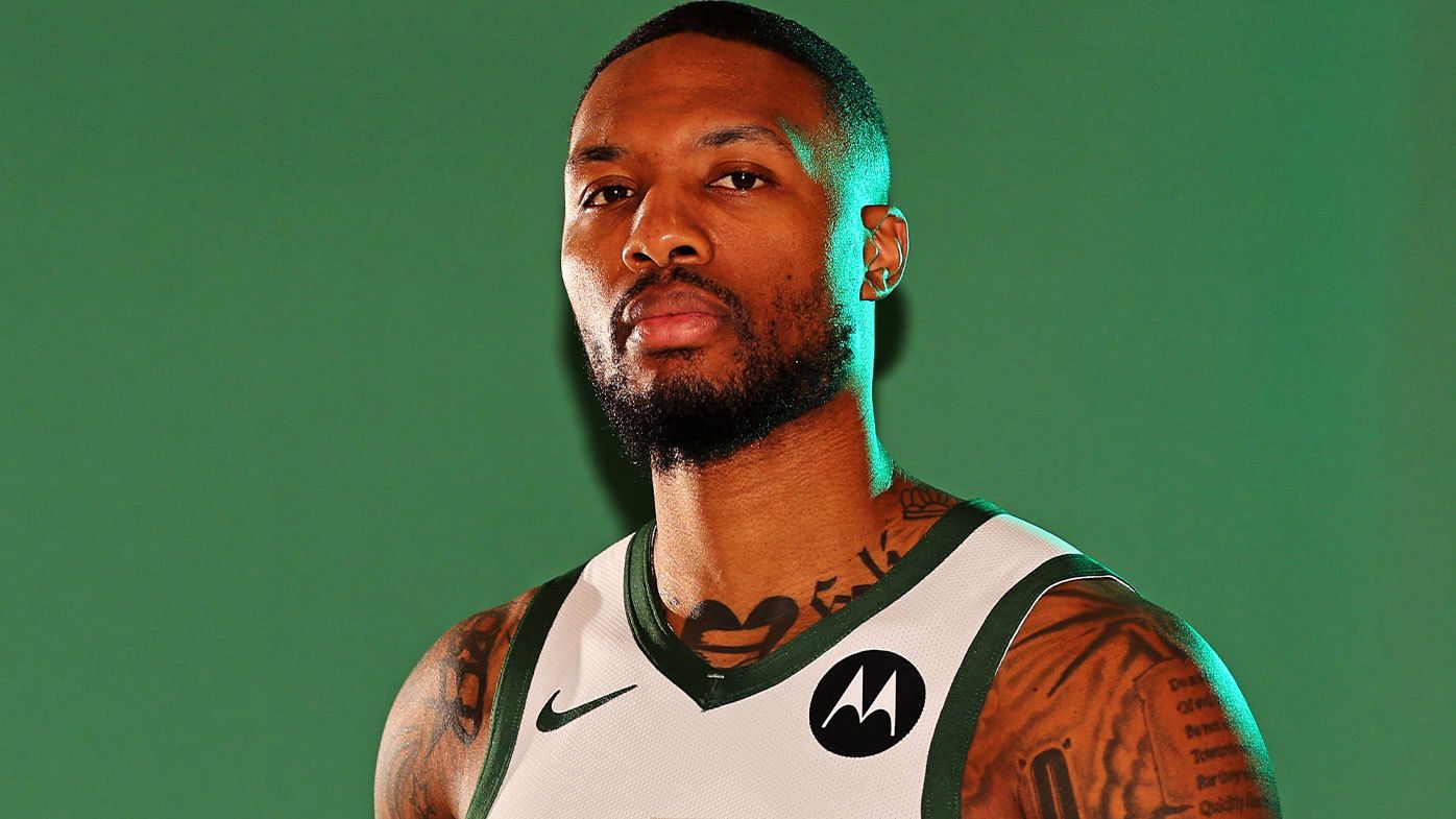 Damian Lillard pictured in Milwaukee Bucks colours during the team&#x27;s media day shoot