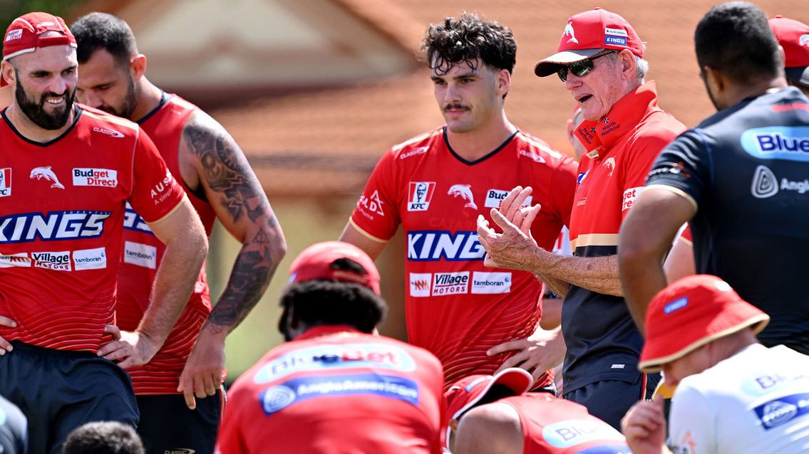 Wayne Bennett lays down the law to Dolphins players at a training session.