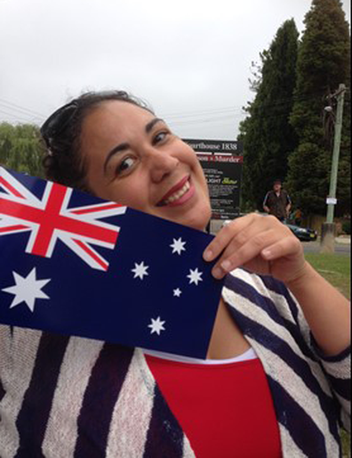 Kathryn Heaven holding an Australian flag